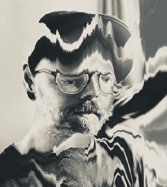 Glitched portrait of Michael Rose in monochrome.