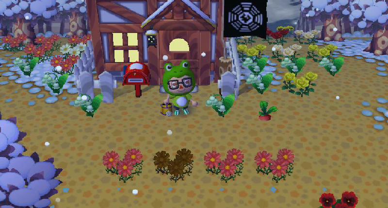 Villager wearing a frog costume, glasses, holding a golden watering can in front of a house with a Dharma flag from LOST in Animal Crossing City Folk.