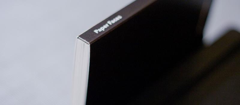 Paper Moleskine book spine with black cover