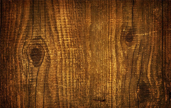 Wood grain with several knots.