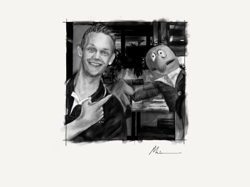 Black and white digital watercolor and pencil portrait of a smiling man in a polo shirt pointing at a puppet with a large nose resembling Burt from Sesame Street. Both are sitting in an office setting.