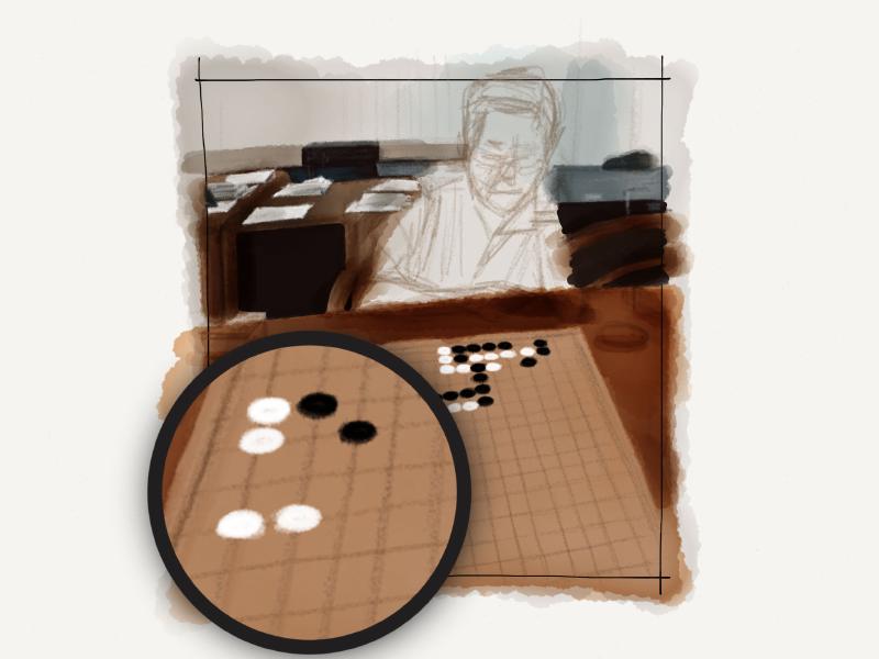 Using the zoom tool to draw the black and white game pieces.