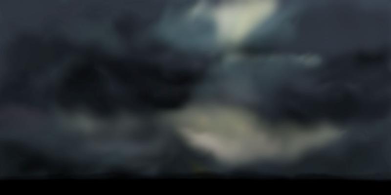 Storm scene of dark gray clouds blurred together.