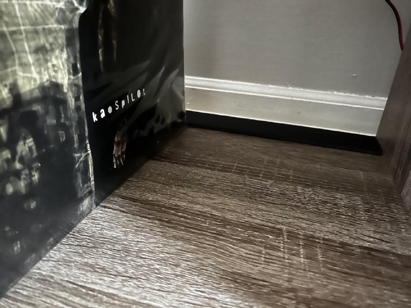 Kaospilot LP album placed on a cube shelf.